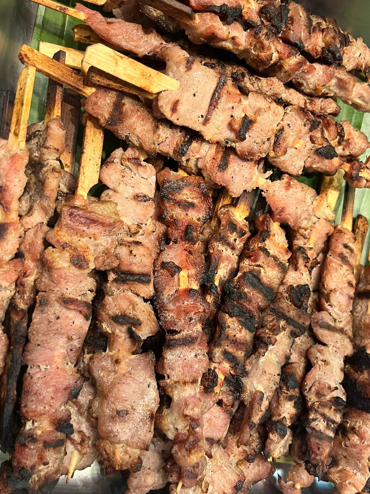 MOO Ping (skewered pork).