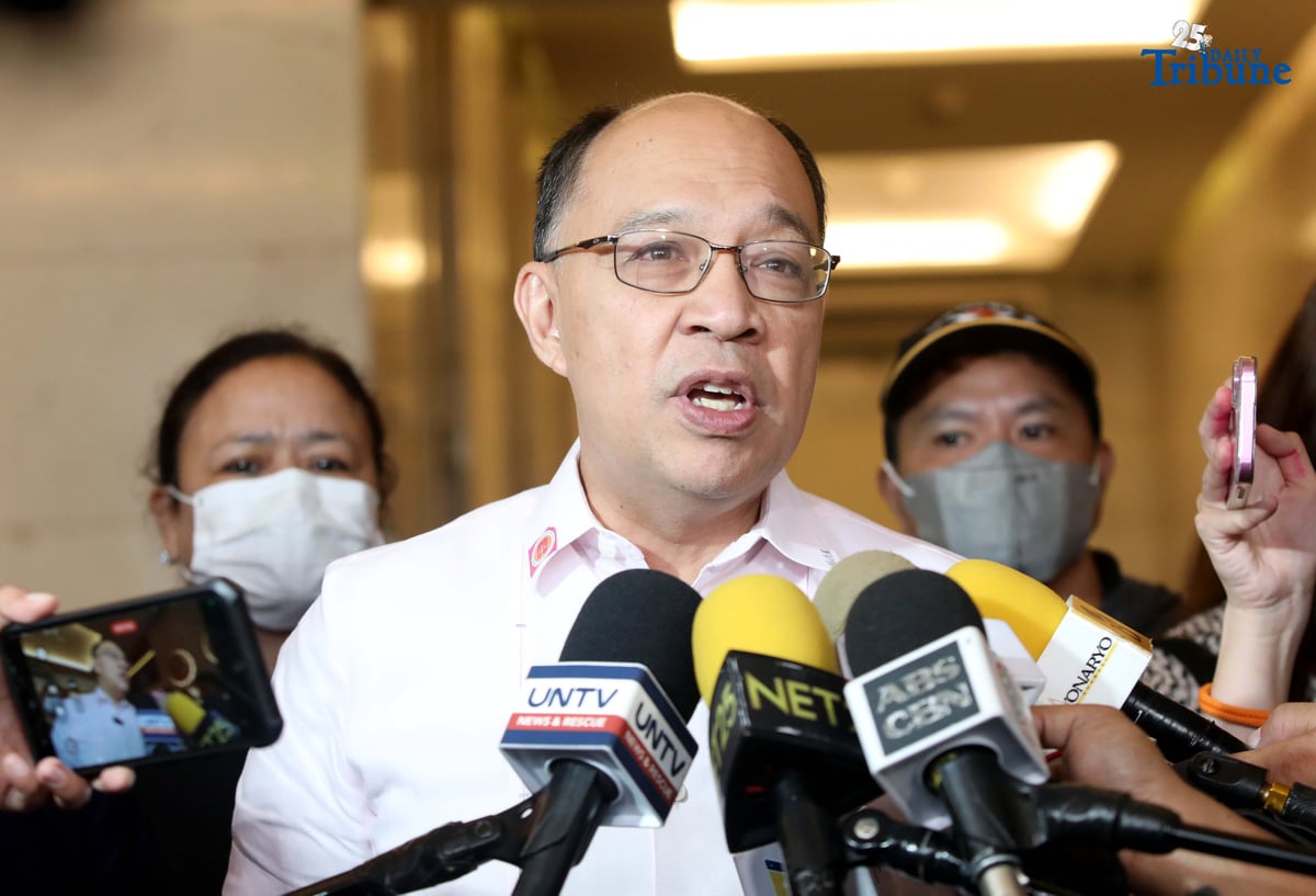 Lawyer Howard Calleja, legal counsel for the relatives of missing sabungeros, speaks to the media during a hearing break at the NAPOLCOM office in Quezon City on Thursday, August 14, 2025. Calleja said their evidence against 12 police officers linked to the disappearance of 30 sabungeros is already strong but noted that additional information to further pin the suspects remains welcome.