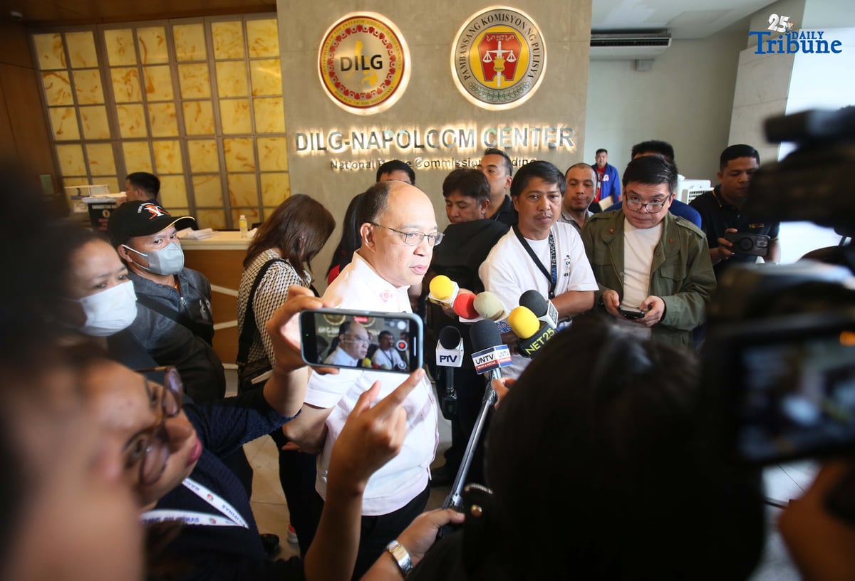 Lawyer Howard Calleja, legal counsel for the relatives of missing sabungeros, speaks to the media during a hearing break at the NAPOLCOM office in Quezon City on Thursday, August 14, 2025. Calleja said their evidence against 12 police officers linked to the disappearance of 30 sabungeros is already strong but noted that additional information to further pin the suspects remains welcome.