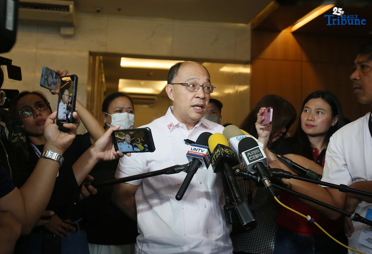 Lawyer Howard Calleja, legal counsel for the relatives of missing sabungeros, speaks to the media during a hearing break at the NAPOLCOM office in Quezon City on Thursday, August 14, 2025. Calleja said their evidence against 12 police officers linked to the disappearance of 30 sabungeros is already strong but noted that additional information to further pin the suspects remains welcome.