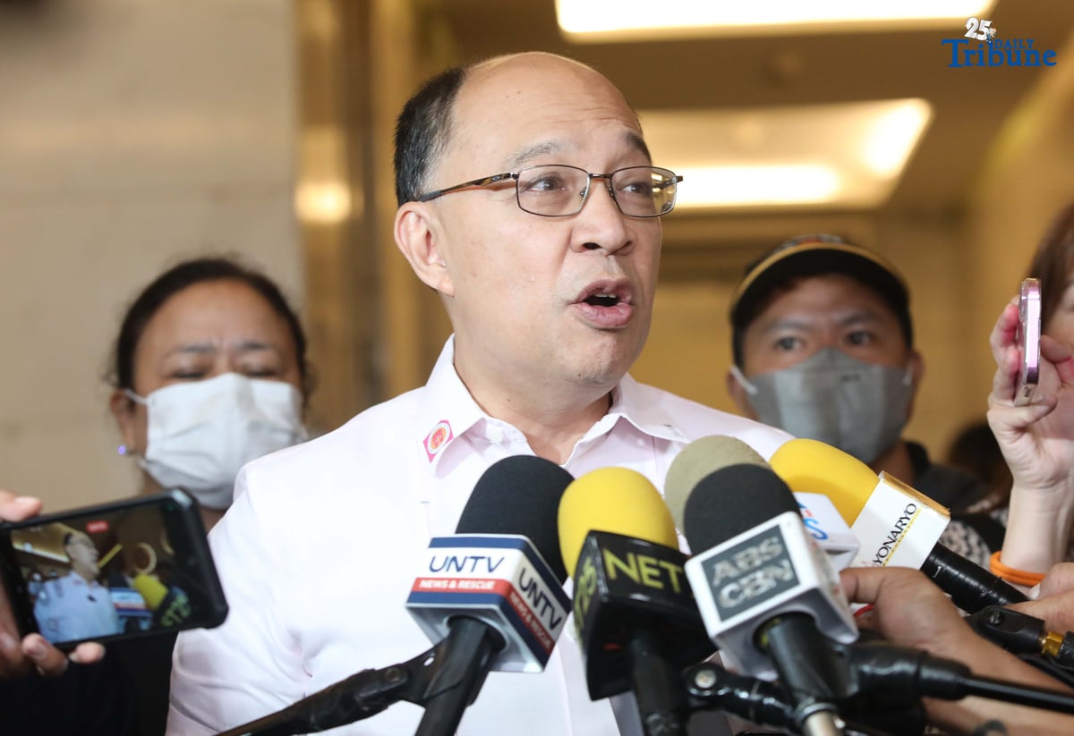 Lawyer Howard Calleja, legal counsel for the relatives of missing sabungeros, speaks to the media during a hearing break at the NAPOLCOM office in Quezon City on Thursday, August 14, 2025. Calleja said their evidence against 12 police officers linked to the disappearance of 30 sabungeros is already strong but noted that additional information to further pin the suspects remains welcome.