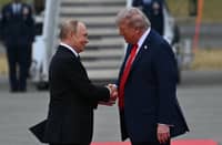Trump, Putin shake hands at start of Alaska summit