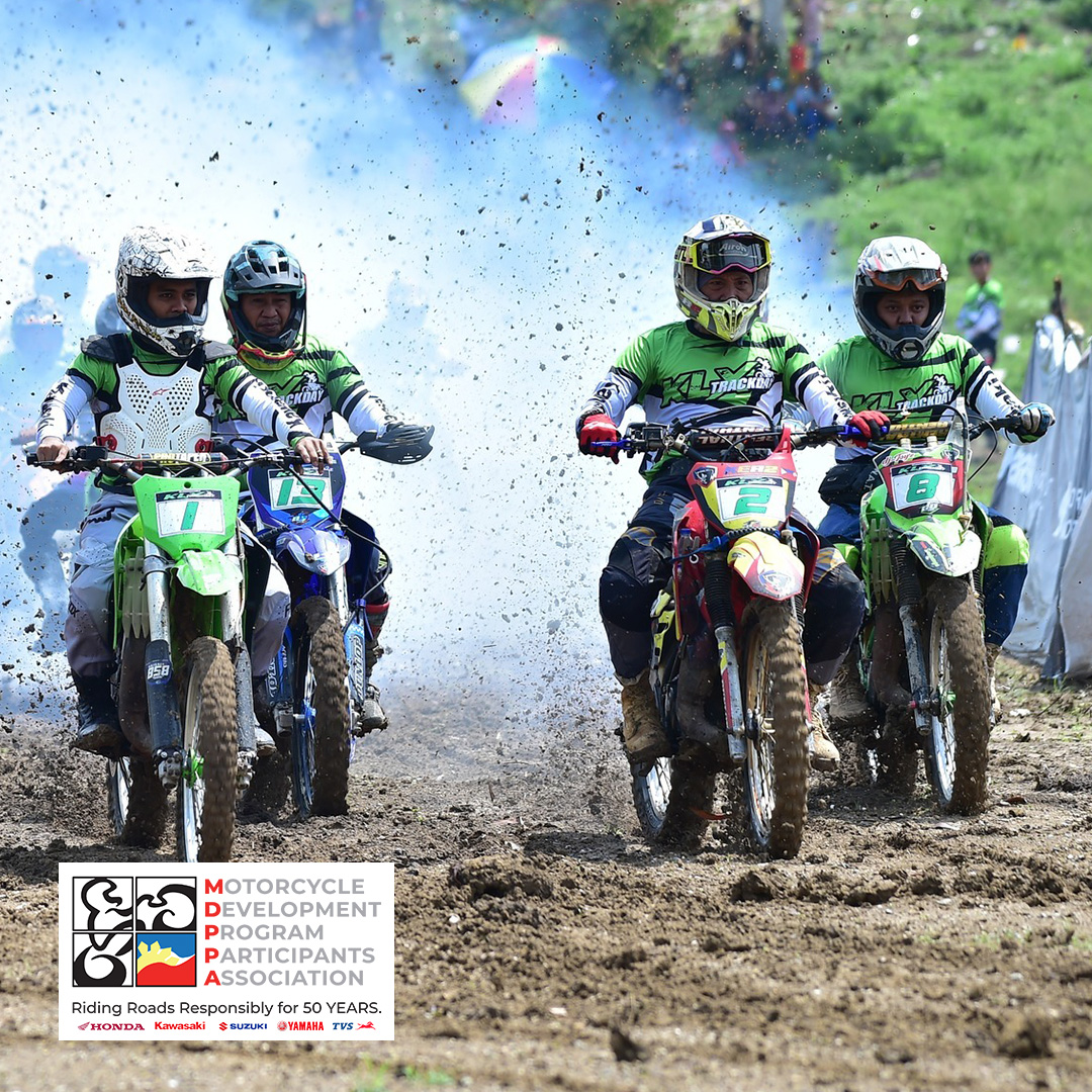 KAWASAKI motocross racers charge through the dirt, highlighting the thrill and skill that fuel the sport.