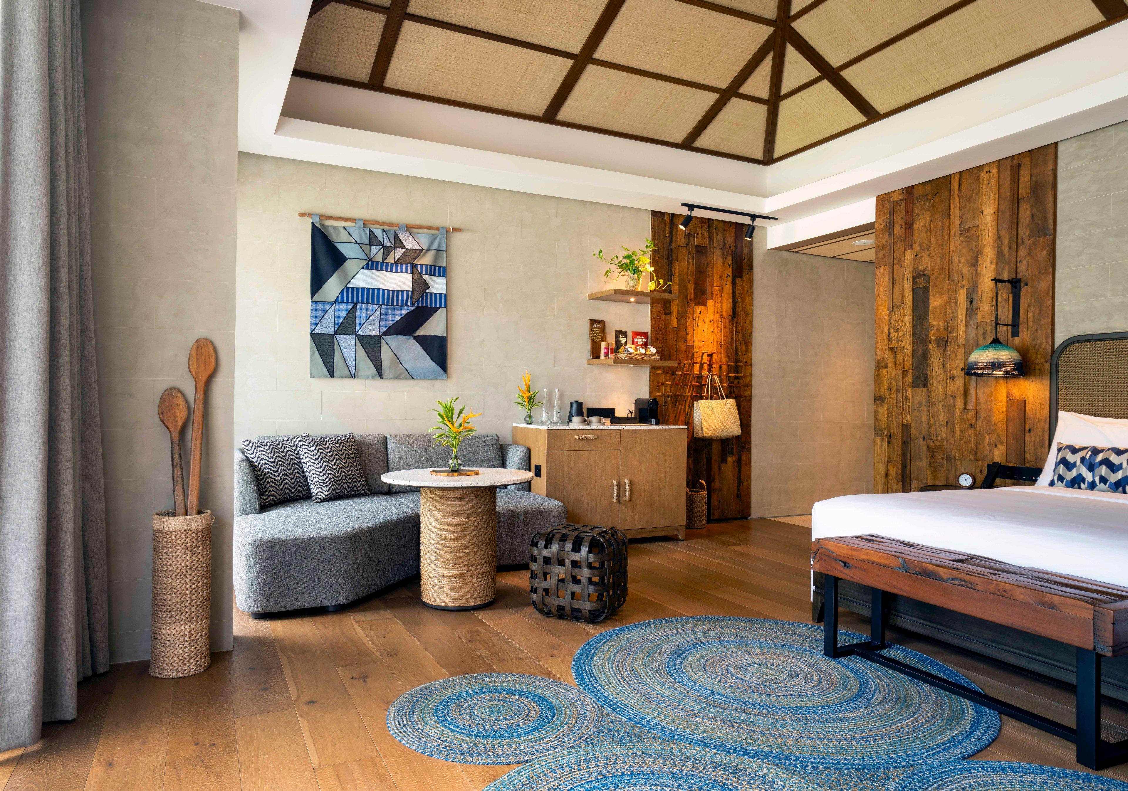 Guest rooms have walls made of recycled Boholano wood, taken from abandoned island homes and put into a mosaic of memories. Handwoven banig headboards, coconut wood furnishings and artisan-made rugs infuse each room with warmth and craftsmanship.