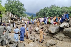 Rescuers dig for bodies after ‘doomsday’ monsoon rains kill 321