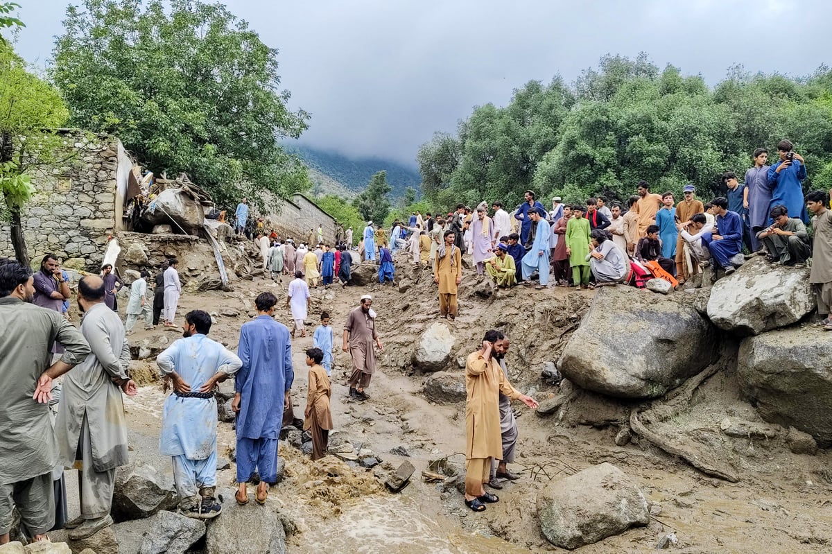 Rescuers dig for bodies after ‘doomsday’ monsoon rains kill 321