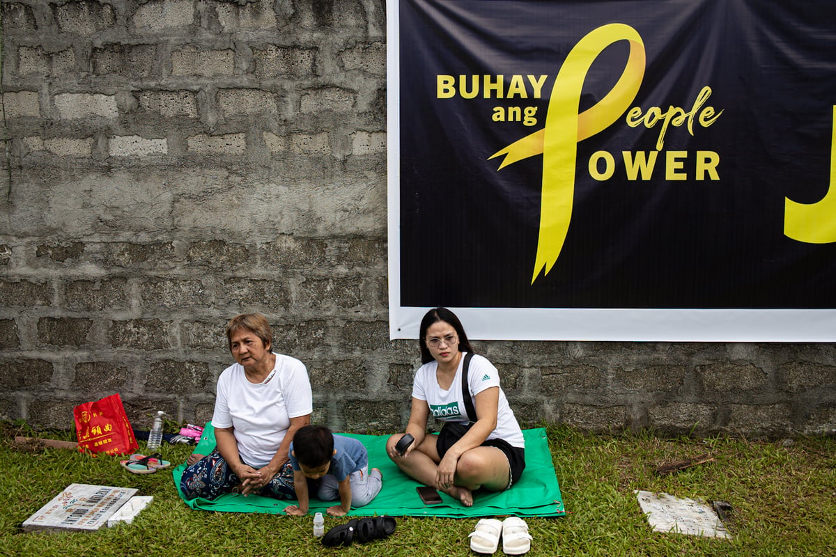 Families of the victims of extrajudicial killings orchestrated by former president Rodrigo Duterte attend the launching of the Justice for All campaign at the Dambana ng Paghilom in La Loma Catholic Cemetery.