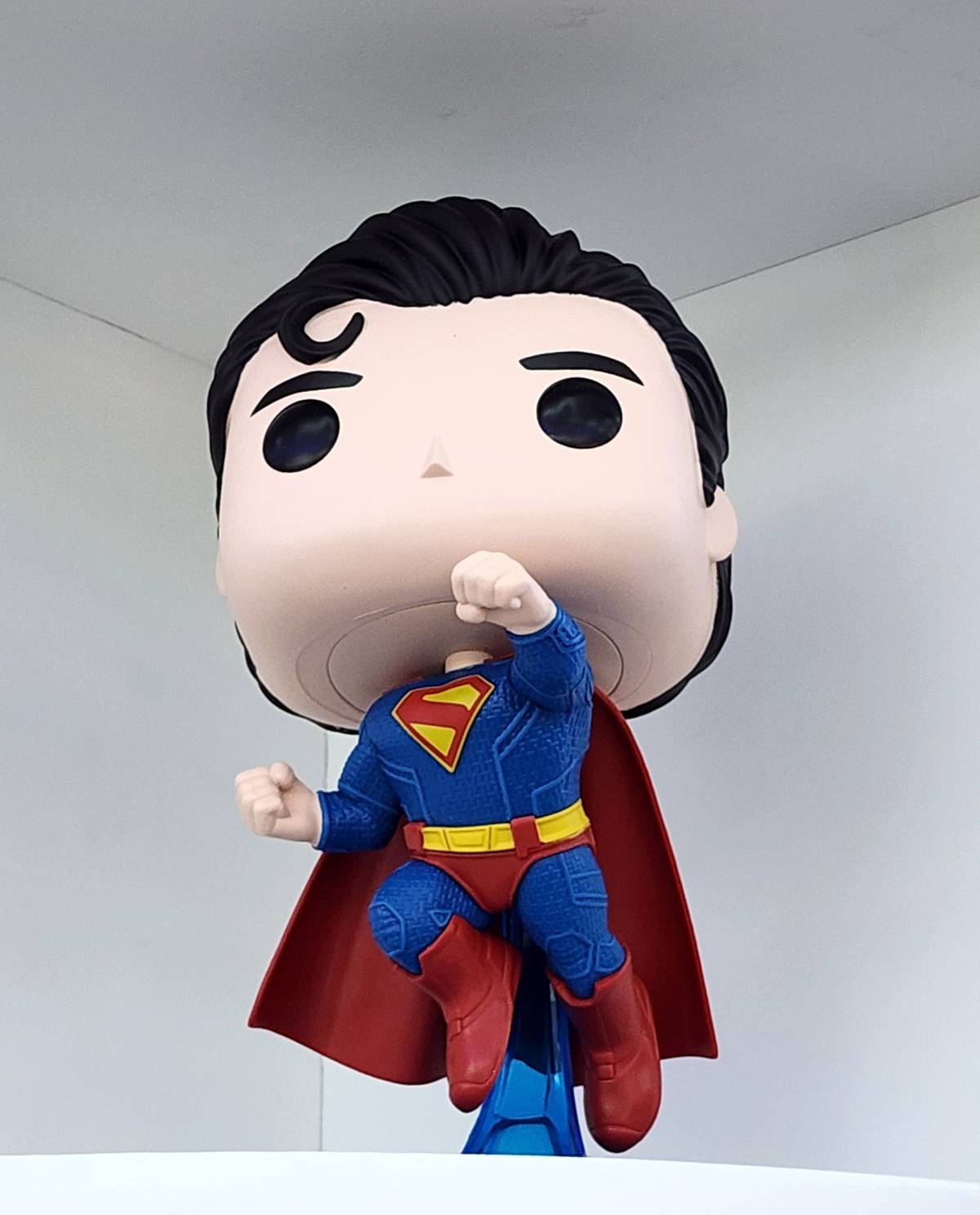 A SupeRman Funko Pop! figure.