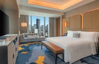 THE Grand Deluxe room at Solaire Resort North, showcasing 49sqm of comfort and luxury – just one of the many rooms to enjoy a delightful staycation