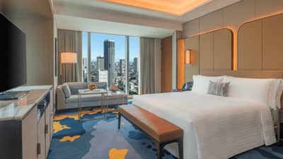 THE Grand Deluxe room at Solaire Resort North, showcasing 49sqm of comfort and luxury – just one of the many rooms to enjoy a delightful staycation
