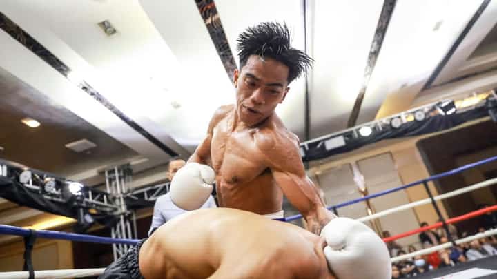 KENNETH Llover punishes Panamanian rival Luis Concepcion in their bout late Sunday at Winford Resort Casino