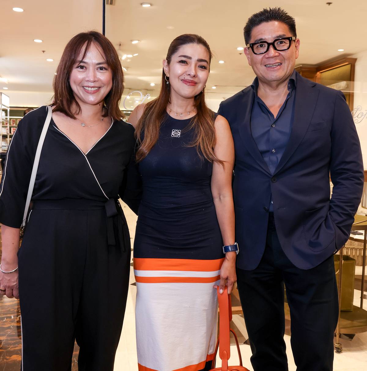 Jackie Avecilla, head of Marketing, Rustan Commercial Corporation, Happy Ongpauco Tiu and Anton Huang, president and CEO of SSI Group Inc., Rustan Commercial Corporation and Rustan Marketing Corporation.