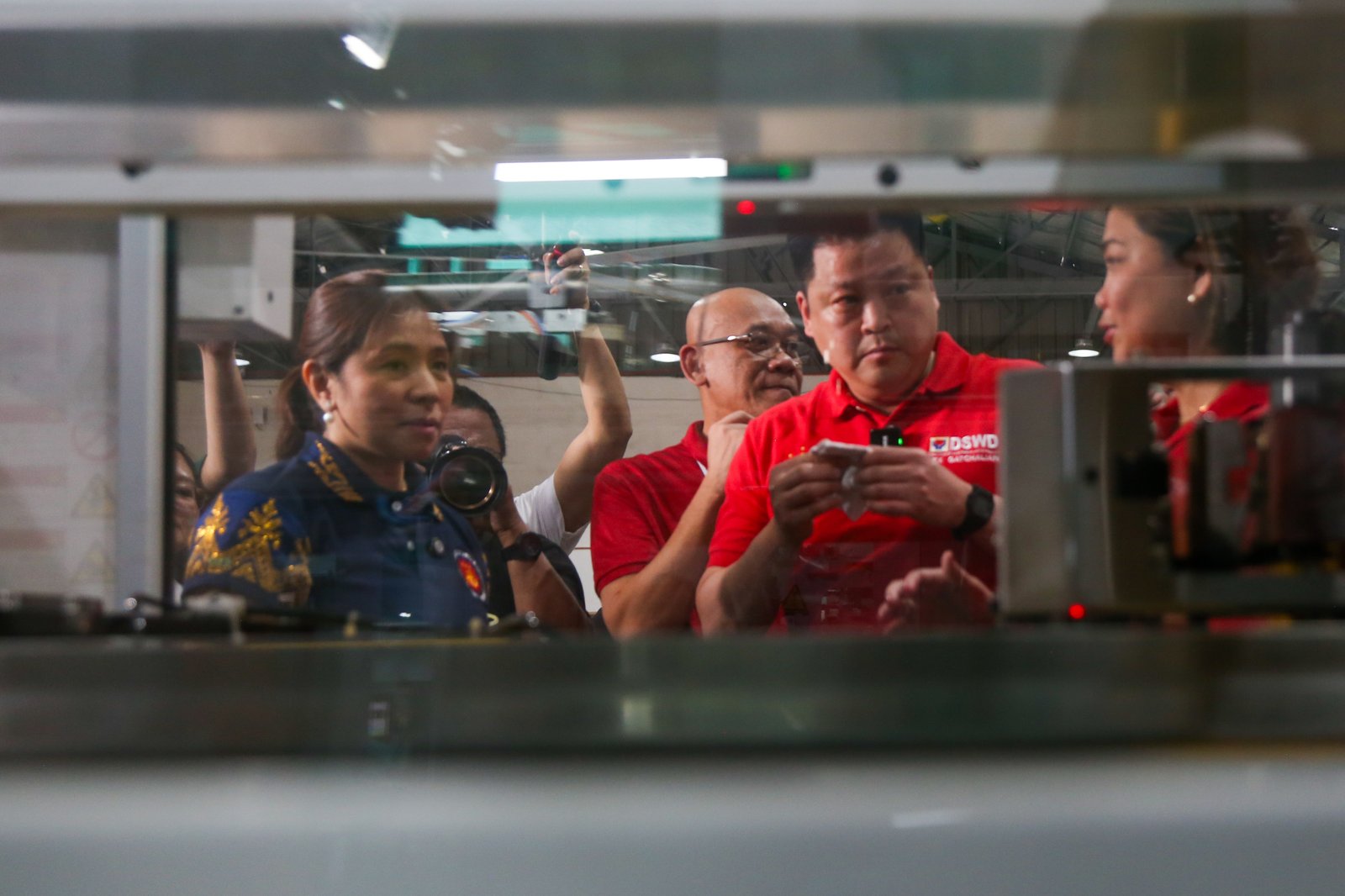 Social Welfare and Development Secretary Rex Gatchalian, joined by Budget and Management Secretary Amenah Pangandaman, inspects the DSWD Family Food Pack warehouse in Parañaque City on the morning of August 19, 2025. The facility serves as a key staging area for the distribution of relief goods to communities in need.