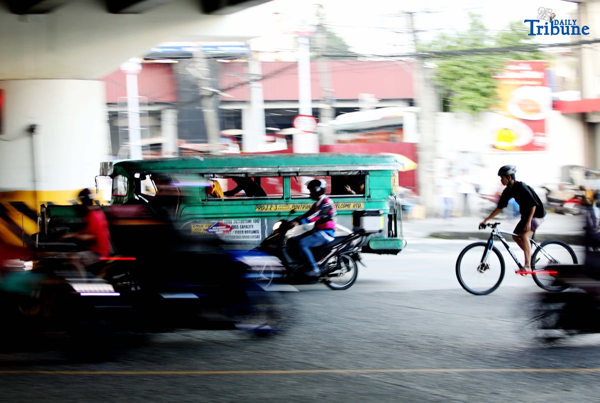 Public utility jeepneys ply along EDSA in Quezon City on Tuesday. The Land Transportation Franchising and Regulatory Board (LTFRB) has given transport groups a non-extendible 10-day deadline to submit their position papers on the proposed ₱1 provisional fare hike for jeepneys.