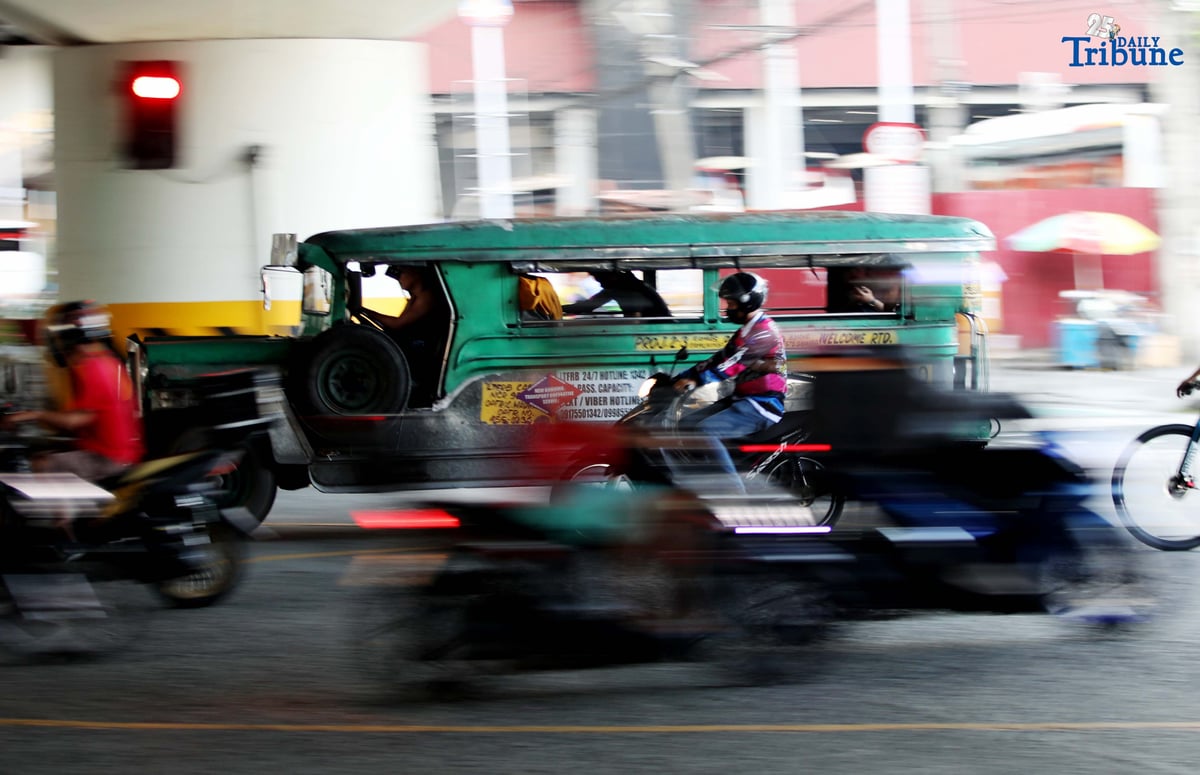 Public utility jeepneys ply along EDSA in Quezon City on Tuesday. The Land Transportation Franchising and Regulatory Board (LTFRB) has given transport groups a non-extendible 10-day deadline to submit their position papers on the proposed ₱1 provisional fare hike for jeepneys.