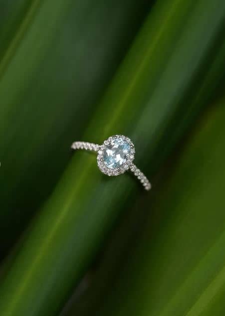 AQUAMARINE diamond halo ring.