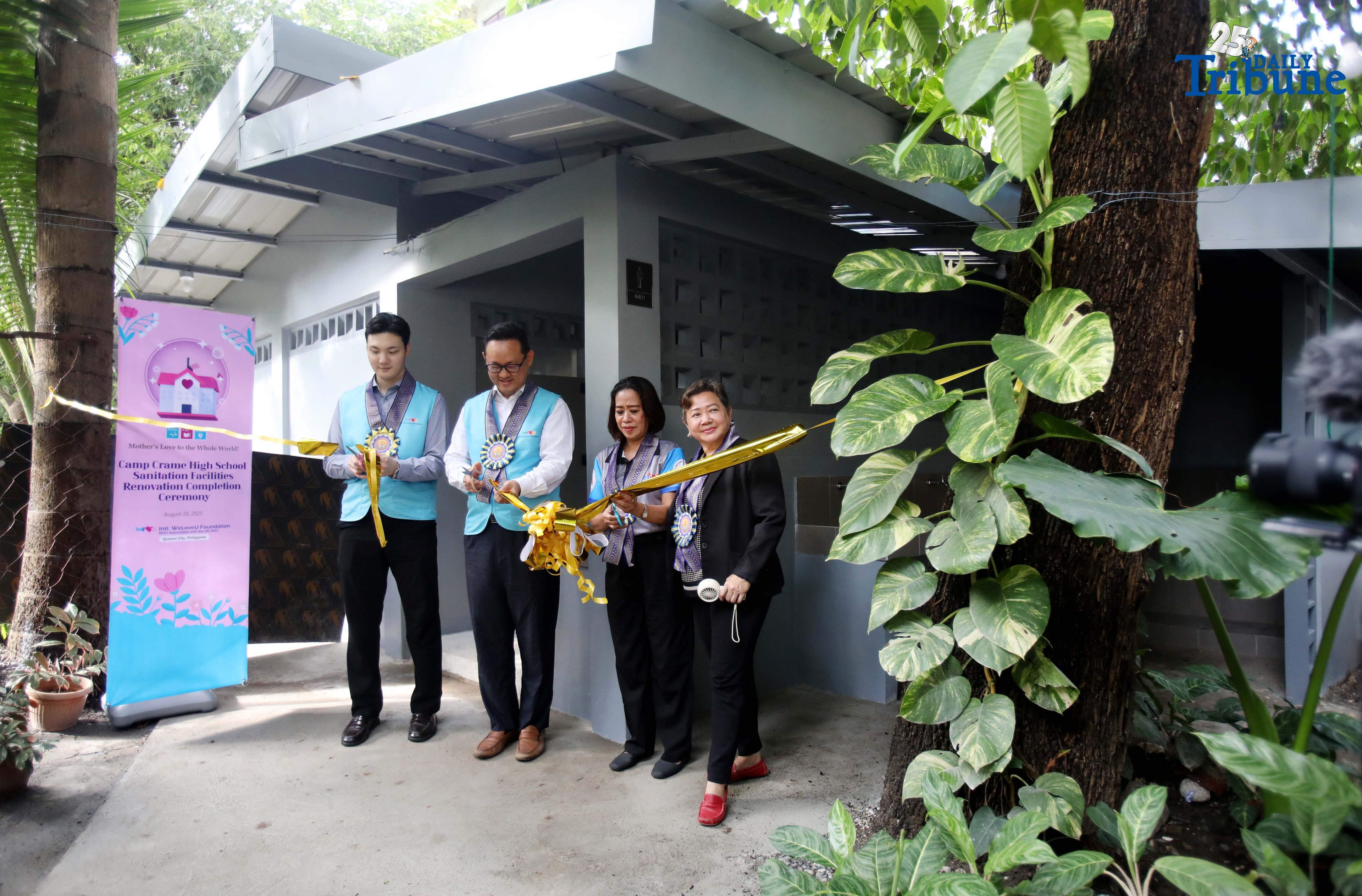 Quezon City Assistant Branch Manager of the International WeLoveU Foundation, Mr. Junha Lee; Quezon City Branch Manager, Mr. Michael Lee; Principal II Dr. Marife Talabucon; and Public Schools Division Supervisor Dr. Edna Galiza lead the symbolic ribbon-cutting during the turnover of newly renovated restrooms at Camp Crame High School on Wednesday, August 20, 2025. The WeLoveU Foundation embodies a mother’s love through volunteerism, striving to enhance the well-being of the global community regardless of nationality, race, socioeconomic status, or religious background.