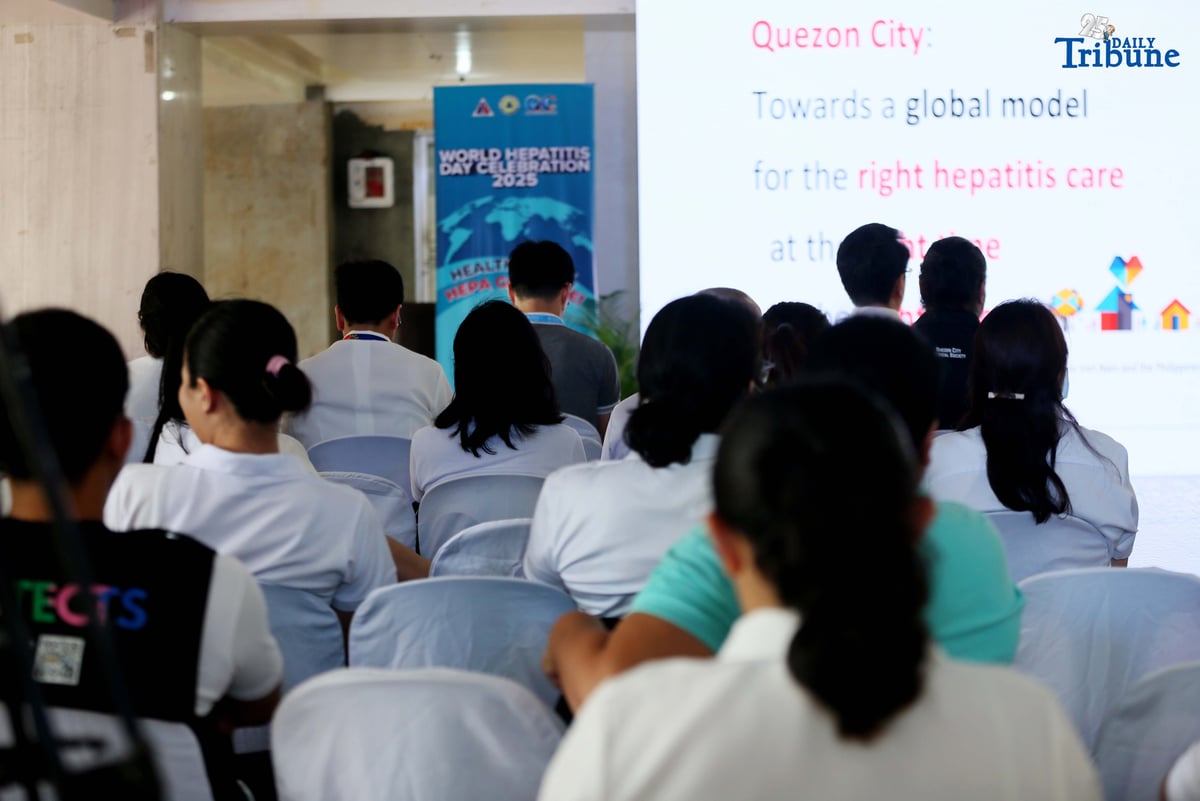 Department of Health Secretary Teodoro J. Herbosa delivers a message on hepatitis via screen to show support for QCitizens during the launch of the Hepatitis B and C Model of Care. The program was led by the Quezon City Health Department (QCHD) and the Office of the City Mayor (OCM), in partnership with Strengthening the Integrated Treatment and Care for Hepatitis (StITCH), as part of the World Hepatitis Day 2025 celebration.