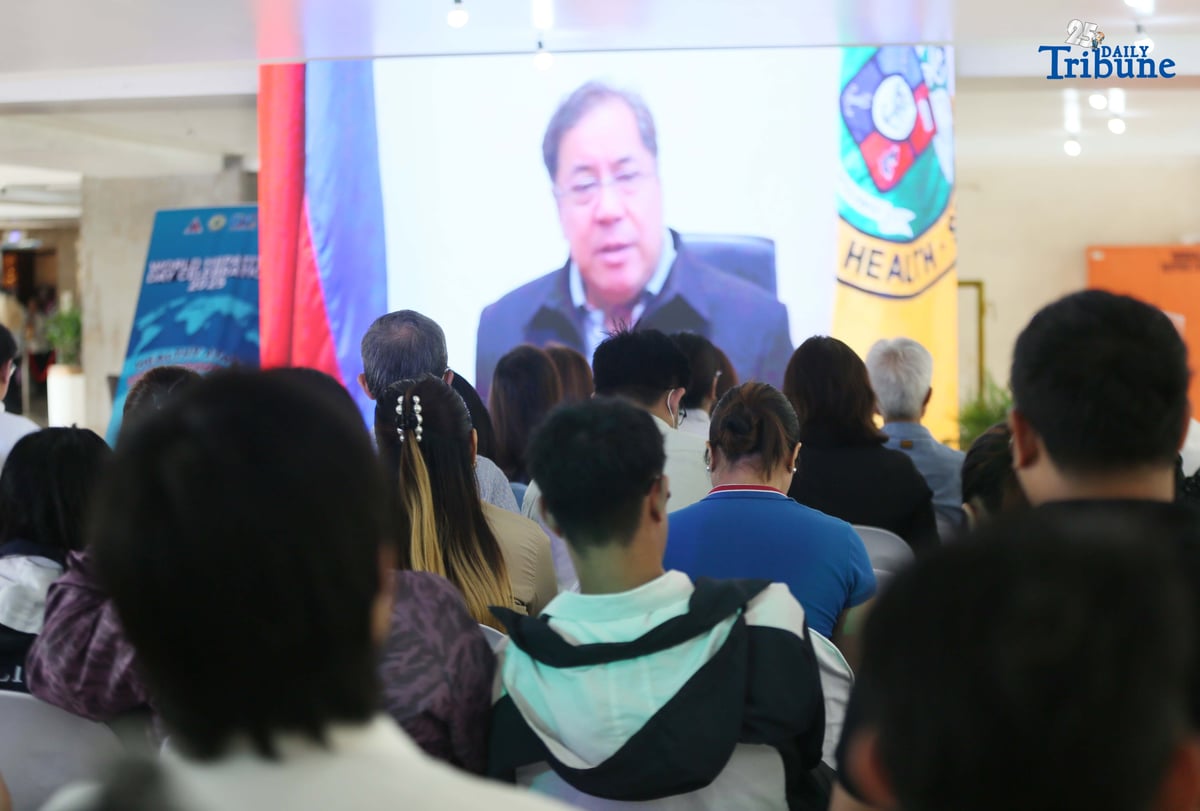 Department of Health Secretary Teodoro J. Herbosa delivers a message on hepatitis via screen to show support for QCitizens during the launch of the Hepatitis B and C Model of Care. The program was led by the Quezon City Health Department (QCHD) and the Office of the City Mayor (OCM), in partnership with Strengthening the Integrated Treatment and Care for Hepatitis (StITCH), as part of the World Hepatitis Day 2025 celebration.