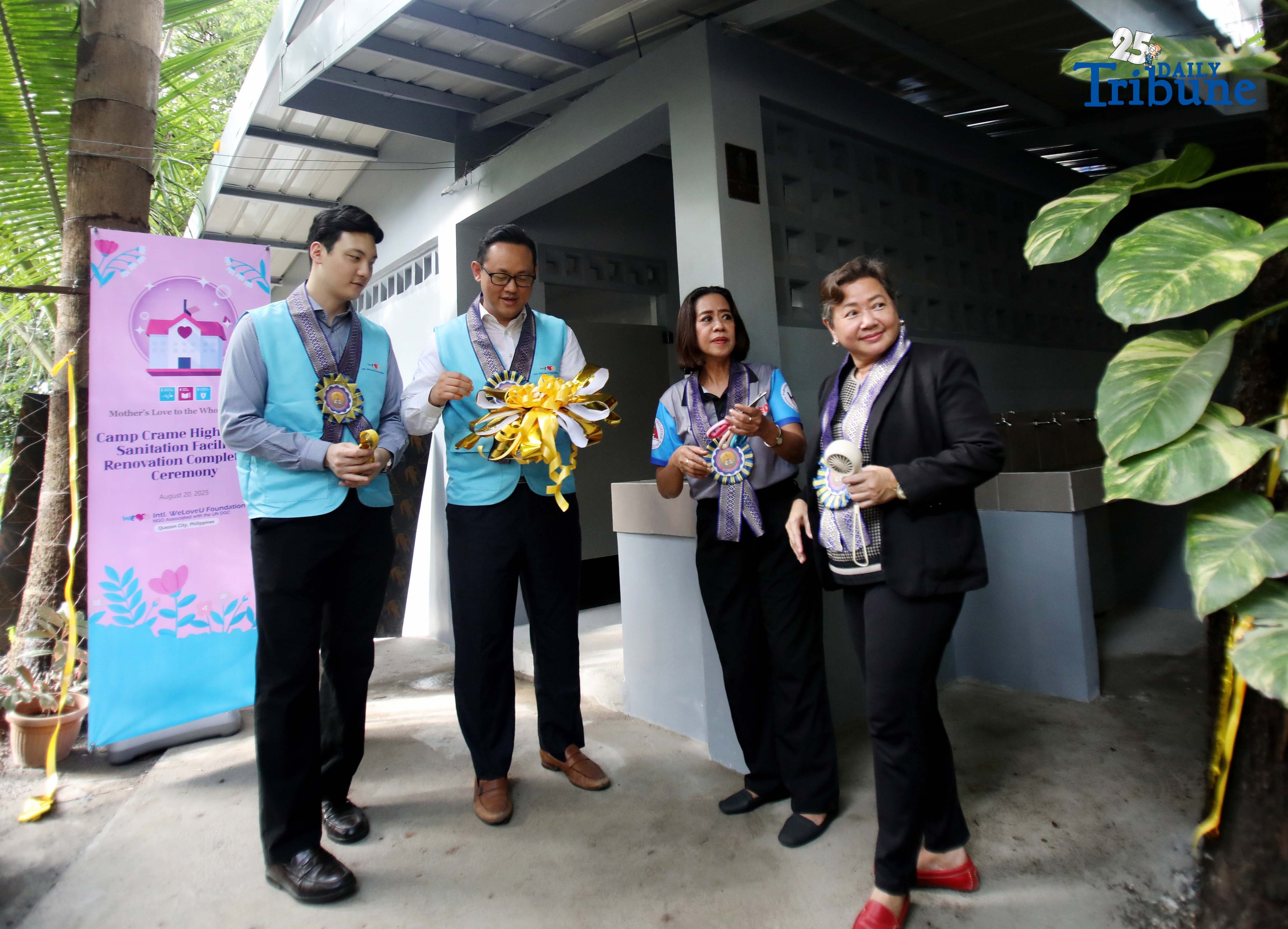 Quezon City Assistant Branch Manager of the International WeLoveU Foundation, Mr. Junha Lee; Quezon City Branch Manager, Mr. Michael Lee; Principal II Dr. Marife Talabucon; and Public Schools Division Supervisor Dr. Edna Galiza lead the symbolic ribbon-cutting during the turnover of newly renovated restrooms at Camp Crame High School on Wednesday, August 20, 2025. The WeLoveU Foundation embodies a mother’s love through volunteerism, striving to enhance the well-being of the global community regardless of nationality, race, socioeconomic status, or religious background.