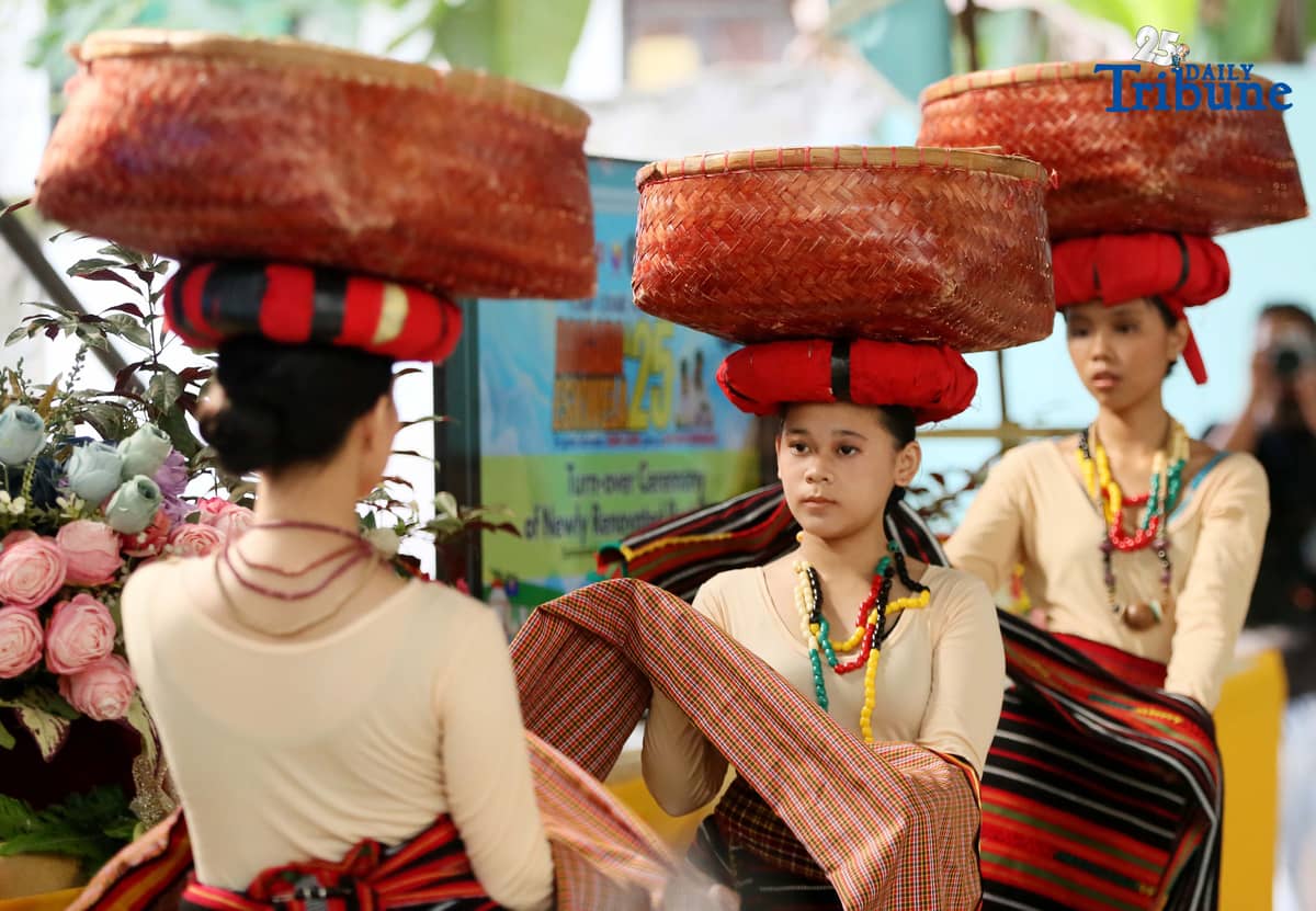 Students of Camp Crame High School perform a folk dance to welcome visitors during the turnover of newly renovated restrooms on Wednesday, August 20, 2025. The WeLoveU Foundation embodies a mother’s love through volunteerism, striving to enhance the well-being of the global community regardless of nationality, race, socioeconomic status, or religious background.