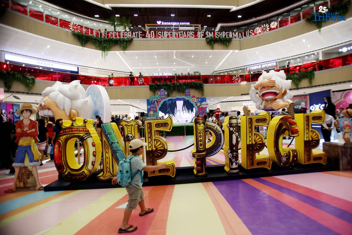 Mall goers take advantage of the holiday as they visit the Animezing North: One Piece Adventures exhibit which features various characters from the anime One Piece at the SM North Edsa in Quezon City on Thursday, August 21, 2025.