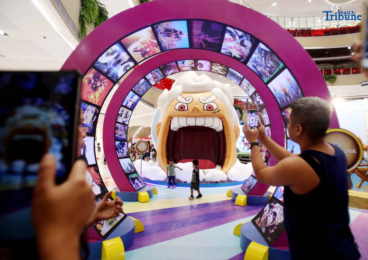 Mall goers take advantage of the holiday as they visit the Animezing North: One Piece Adventures exhibit which features various characters from the anime One Piece at the SM North Edsa in Quezon City on Thursday, August 21, 2025.