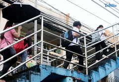 Quezon City holds classes amid rains