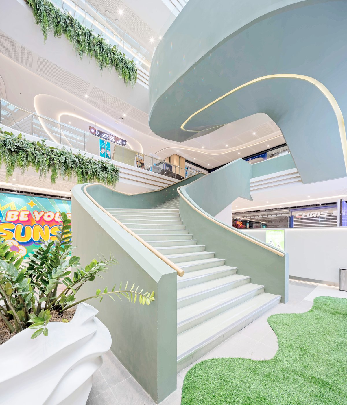 More than just another retail space, SM City Laoag is a visual and emotional homage to Ilocos Norte’s distinct character and natural beauty. The mall’s coastal desert-inspired interiors evoke the shifting silhouettes of the Laoag sand dunes, captured in flowing curves, warm earth tones and organic shapes throughout the structure. Sunlight gently pours through an Inabel-inspired skylight — a nod to the region’s iconic handwoven textile. This feature does more than honor tradition; it also supports sustainability by maximizing the mall’s use of natural daylight, in tune with Laoag’s nickname, the Sunshine City.