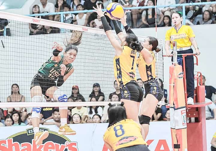 Ghanna Suan of USC penetrates the defense of USPF’s Katrina Inot and Belle Gallarde en route to a 22-25, 25-17, 25-23, 25-14 win during their 2025 SSL National Invitational Cebu leg Sunday in Mandaue City, Cebu.