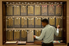 Gold prices dip as strong dollar offsets Fed rate-cut hopes