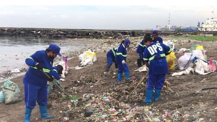 WORKERS from the Department of Public Services-Baseco Beach Warriors conduct clearing operations at the area as part of the local government’s commitment to maintaining a clean environment, including its waterways.