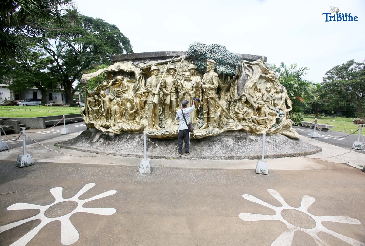 A caretaker cleans the two-sided mural sculpture of Philippine heroine Tandang Sora, known as the “Grand Old Lady of the Philippine Revolution,” who cared for wounded revolutionaries during the struggle for independence. The mural is located inside Himlayang Pilipino Memorial Park in Quezon City, where the tribute was done on Monday, 25 August 2025, as the nation marked National Heroes Day.