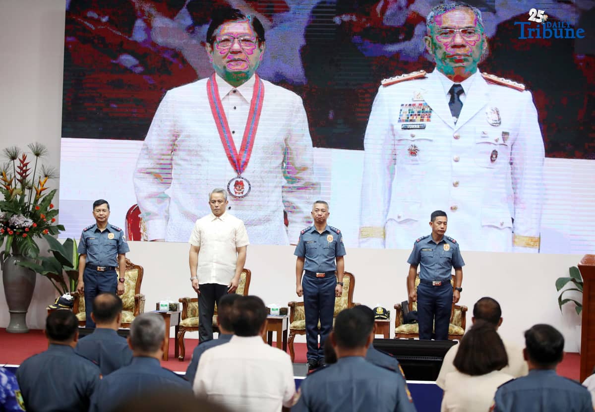 DILG Secretary Jonvic Remulla administers the oath of PLt. Gen. Jose Melencio Nartatez Jr. as officer-in-charge of the Philippine National Police during the assumption of command ceremony at Camp Crame, Quezon City, on Tuesday. Nartatez replaced PNP Chief Gen. Nicolas Torre III.