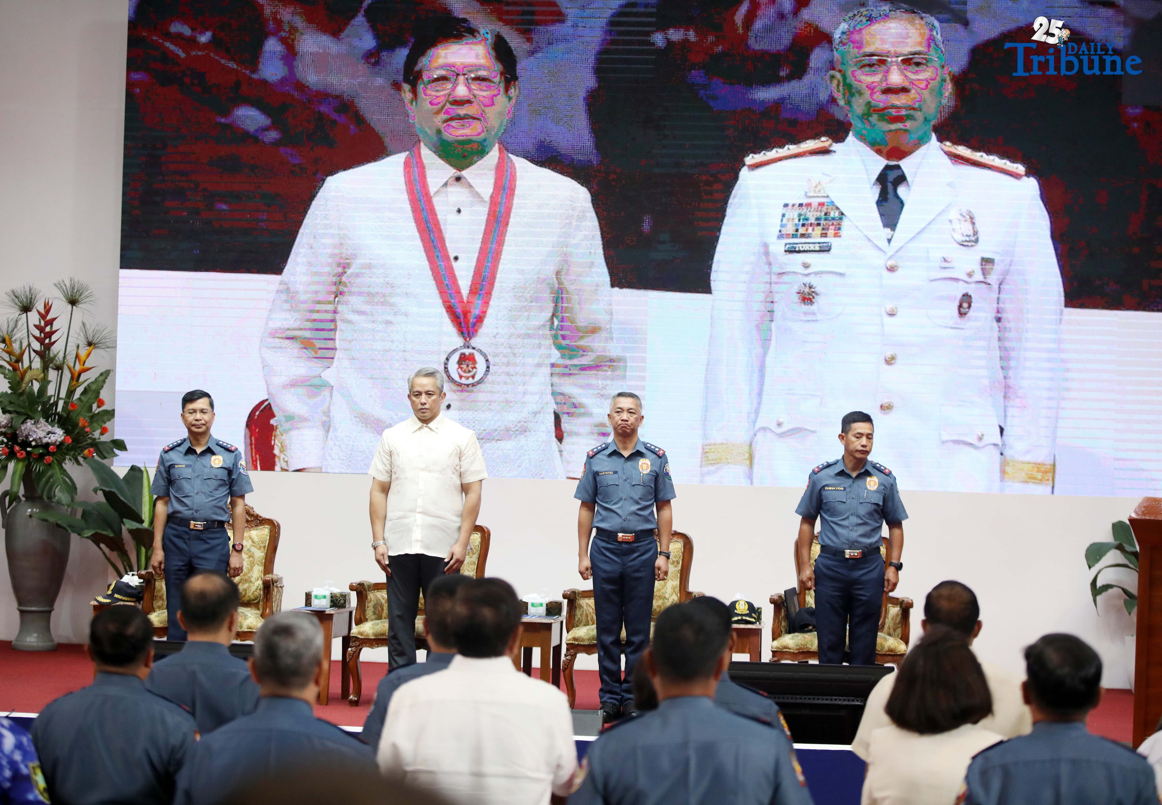 DILG Secretary Jonvic Remulla administers the oath of PLt. Gen. Jose Melencio Nartatez Jr. as officer-in-charge of the Philippine National Police during the assumption of command ceremony at Camp Crame, Quezon City, on Tuesday. Nartatez replaced PNP Chief Gen. Nicolas Torre III.