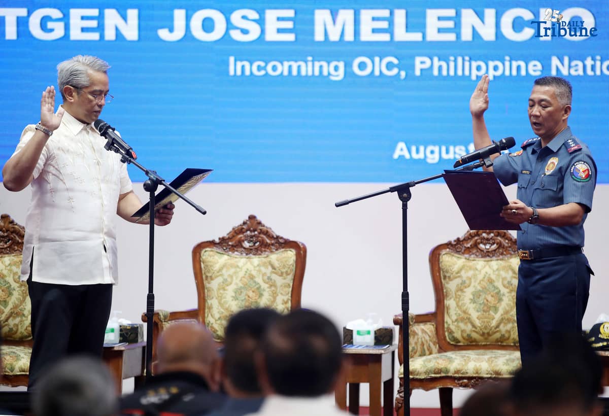 DILG Secretary Jonvic Remulla administers the oath of PLt. Gen. Jose Melencio Nartatez Jr. as officer-in-charge of the Philippine National Police during the assumption of command ceremony at Camp Crame, Quezon City, on Tuesday. Nartatez replaced PNP Chief Gen. Nicolas Torre III.