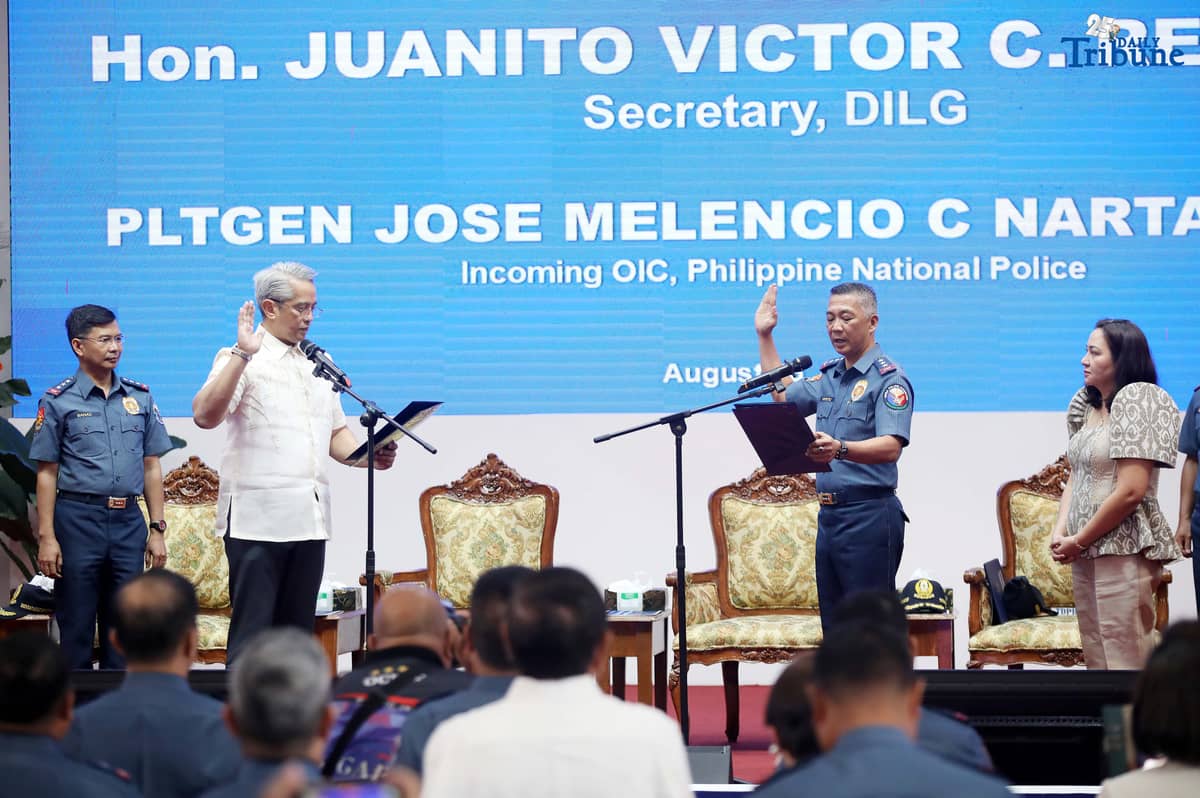 DILG Secretary Jonvic Remulla administers the oath of PLt. Gen. Jose Melencio Nartatez Jr. as officer-in-charge of the Philippine National Police during the assumption of command ceremony at Camp Crame, Quezon City, on Tuesday. Nartatez replaced PNP Chief Gen. Nicolas Torre III.
