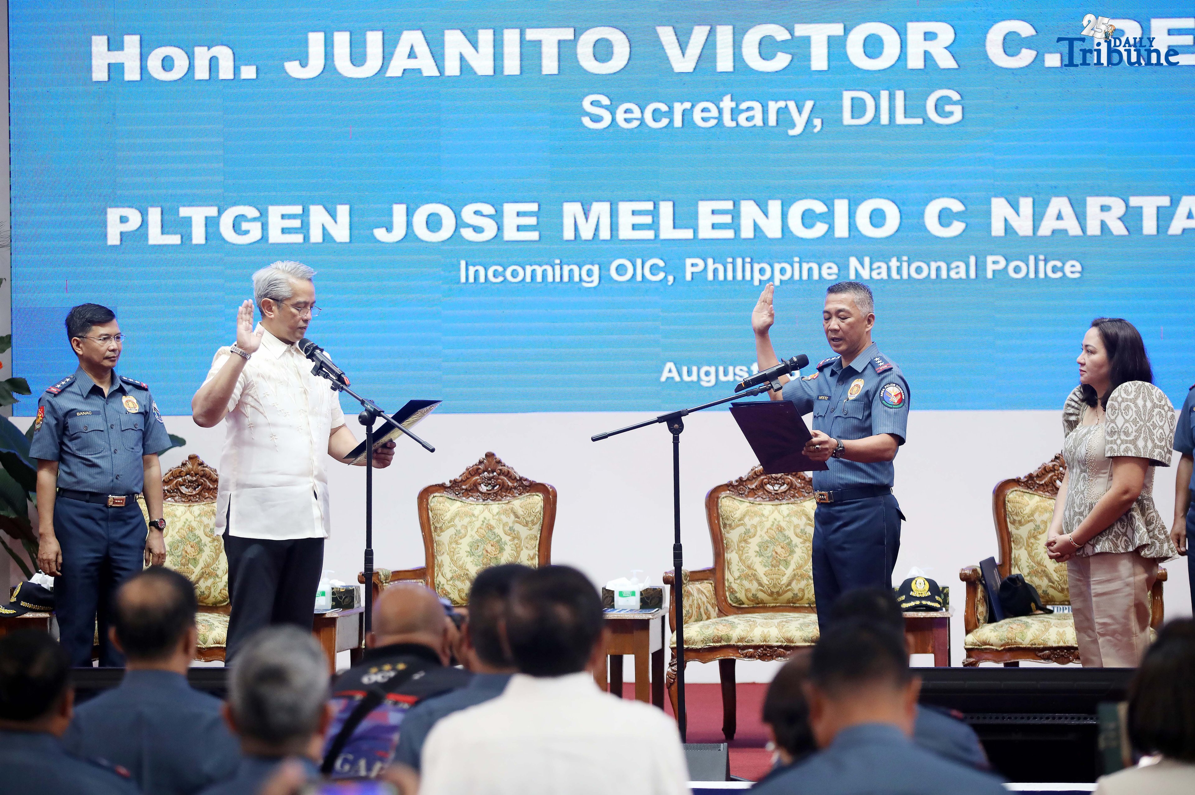 DILG Secretary Jonvic Remulla administers the oath of PLt. Gen. Jose Melencio Nartatez Jr. as officer-in-charge of the Philippine National Police during the assumption of command ceremony at Camp Crame, Quezon City, on Tuesday. Nartatez replaced PNP Chief Gen. Nicolas Torre III.