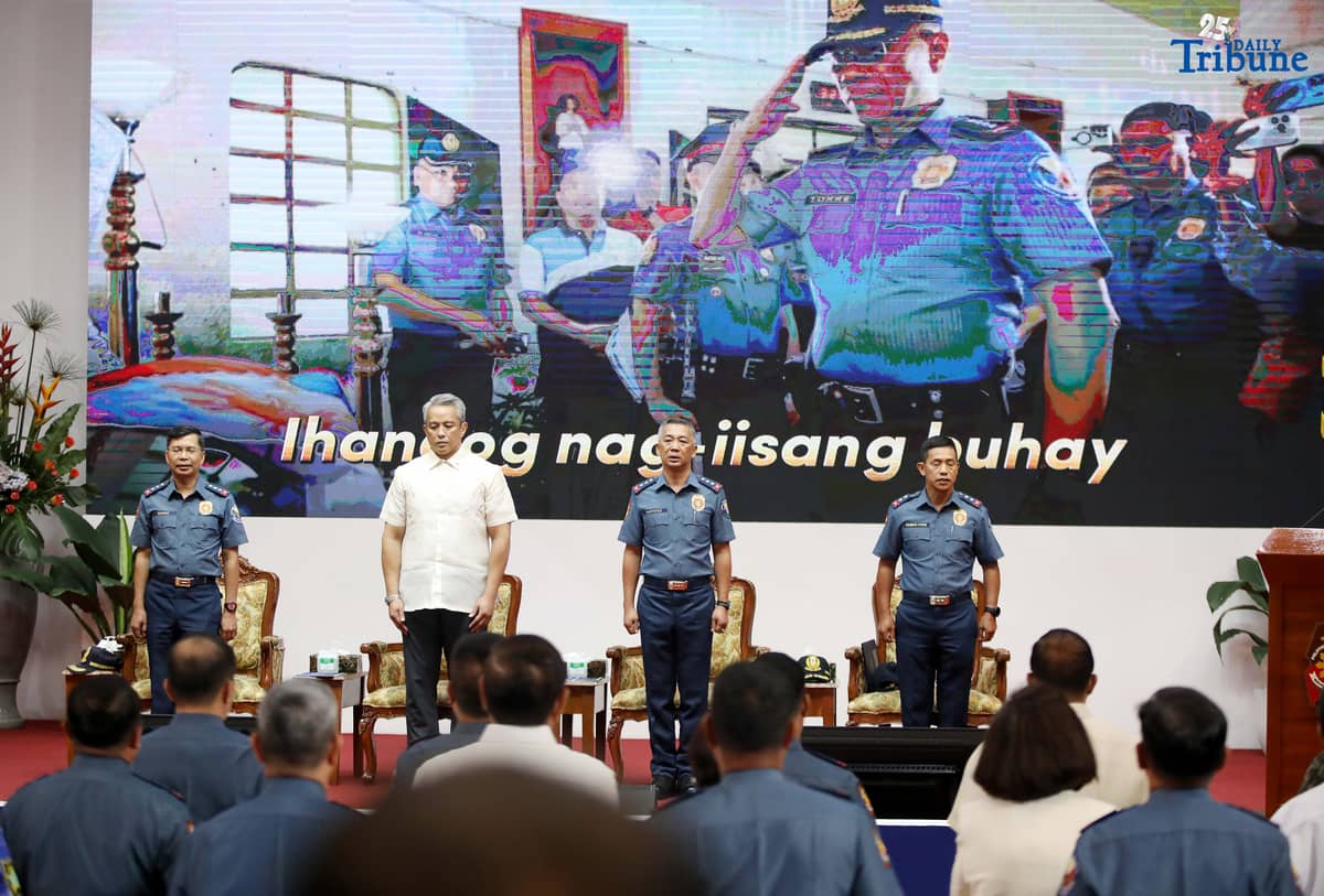 DILG Secretary Jonvic Remulla administers the oath of PLt. Gen. Jose Melencio Nartatez Jr. as officer-in-charge of the Philippine National Police during the assumption of command ceremony at Camp Crame, Quezon City, on Tuesday. Nartatez replaced PNP Chief Gen. Nicolas Torre III.