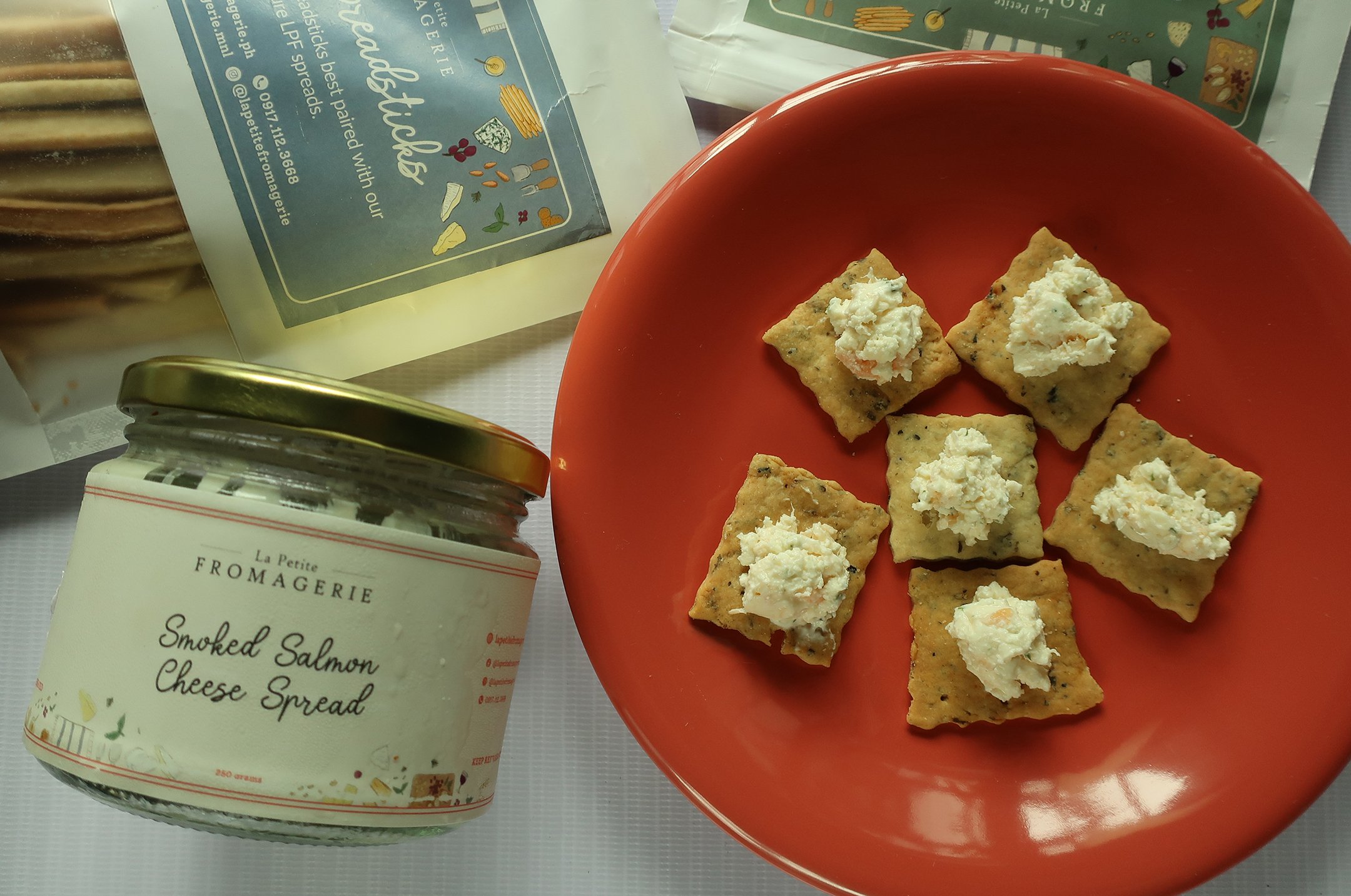 Smoked Salmon Cheese Spread on Herb Crackers.