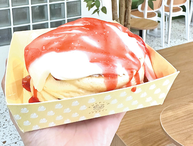 Soft, jiggly Strawberry Mochi Soufflé Pancake is made fresh at Puffy’s
Soufflé Pancake Café.