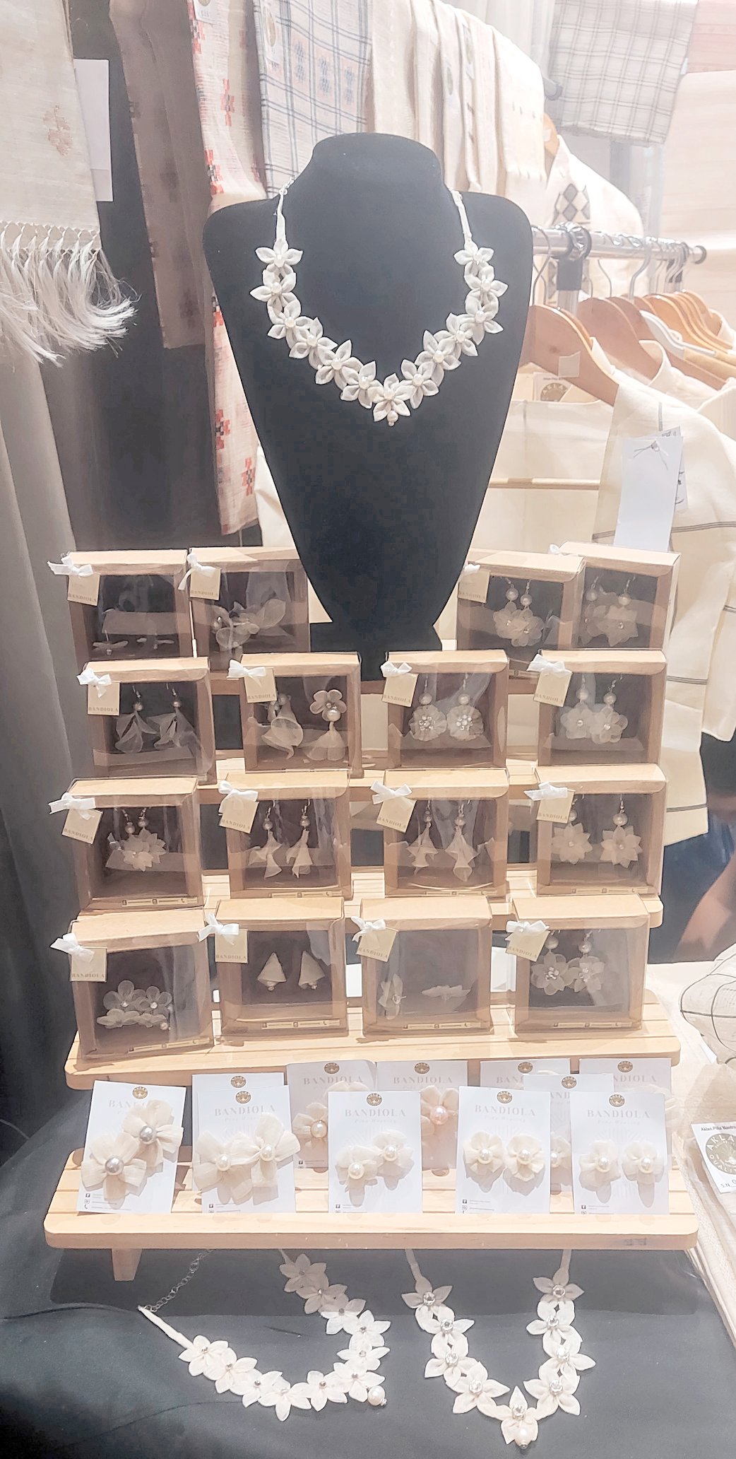 EARRINGS and necklaces made of leftover pina and Boracay pearls.