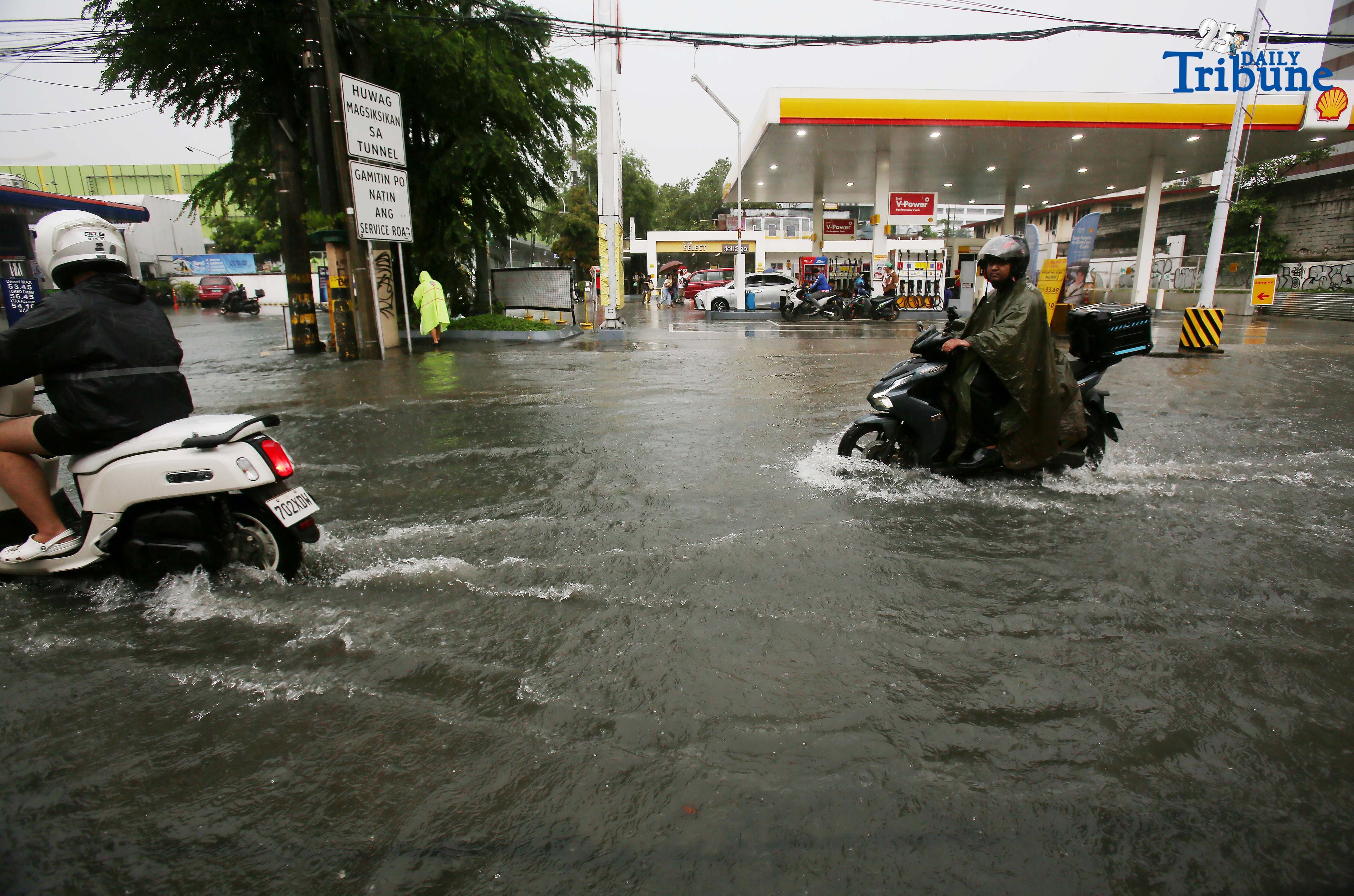 QC drainage overwhelmed by ‘extraordinary’ rain, says MMDA