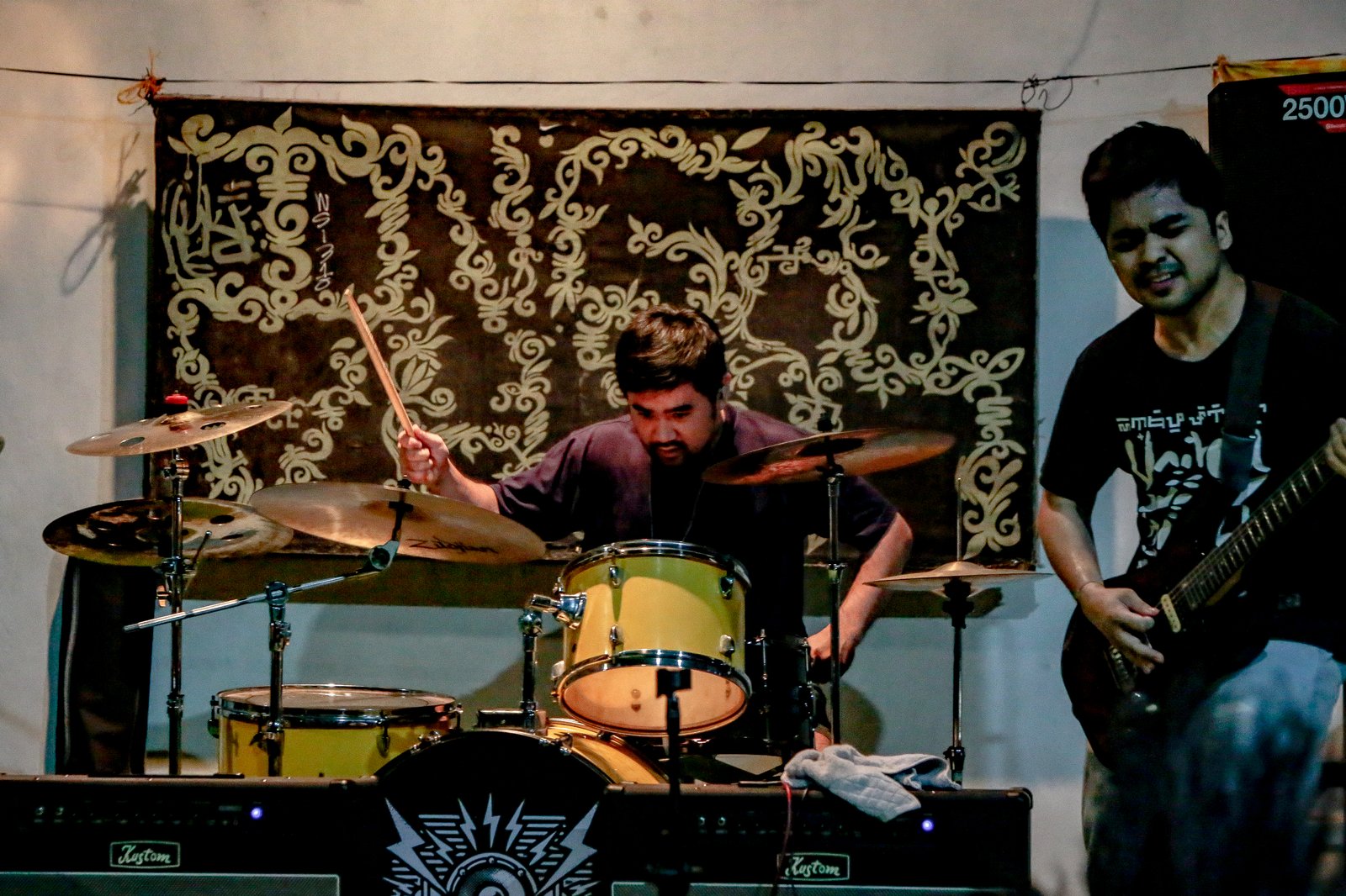 After an eight-month hiatus, art-based non-profit collective Ingay Likha made a comeback with a music and community event at Molino Homes 2 Covered Court in Dasmariñas, Cavite, on Saturday, August 30, 2025. In partnership with peace-advocacy punk group Food Not Bombs, the event featured diverse music genres, spoken word poetry, gift-giving, feeding activities, and a coloring session for children, continuing its push for inclusivity and subcultural expression.