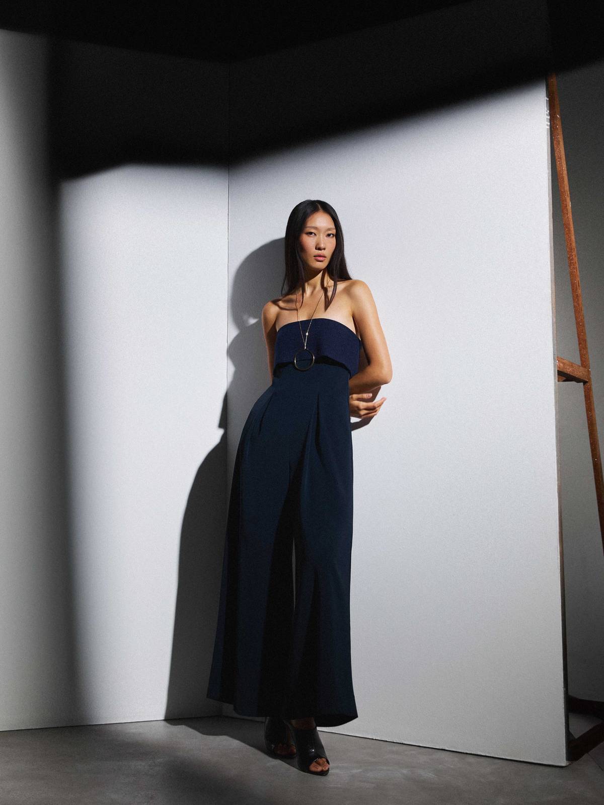 STRAPLESS navy jumpsuit.