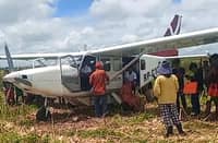 Authorities check on the seven passengers — including the pilot — after a Sky Pasada airplane makes an emergency landing at Barangay District 1 in Reina Mercedes, Isabela on Sunday. The passengers and the pilot are all safe.