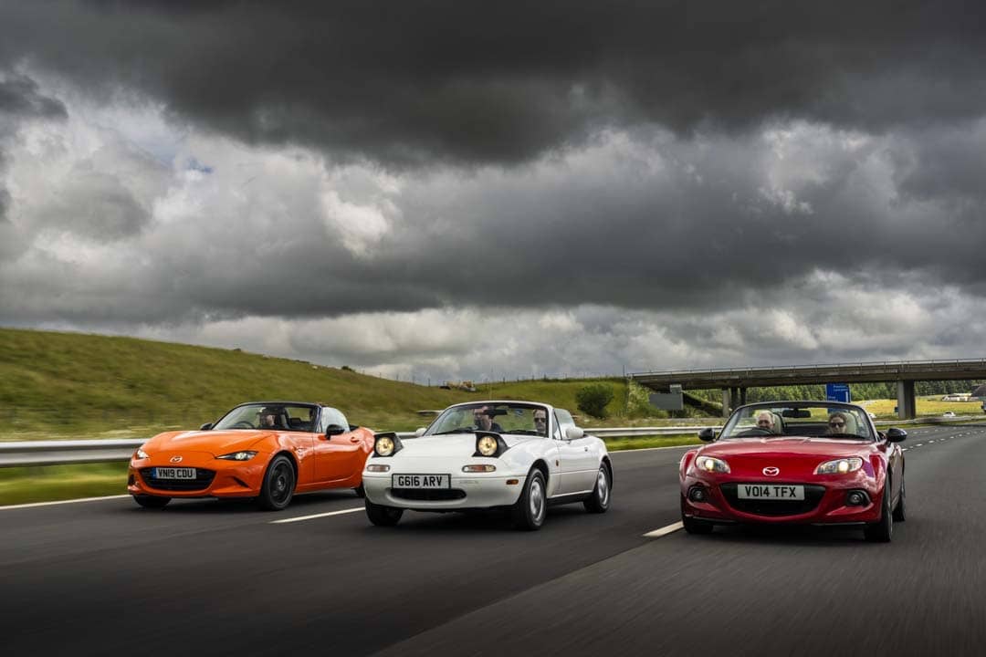 CLASSIC and modern MX-5s share the highway, proving the timeless appeal of the two-seater roadster.