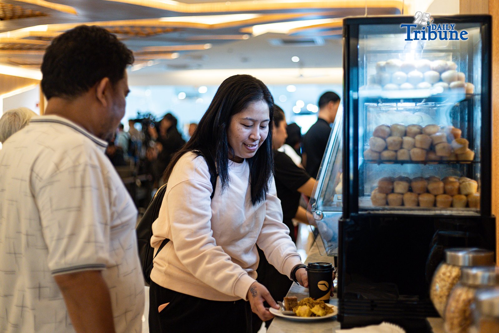 Overseas Workers Welfare Administration (OWWA) Administrator Patricia Yvonne Caunan tours the media around the newly renovated OFW Lounge at NAIA Terminal 3 on Monday, 1 September 2025. 

The revamped lounge for OFWs features multiple charging stations, complimentary drinks and snacks, an air-conditioned "business class" area for comfort, and a dedicated staff to maintain cleanliness and organization. OFWs facing delayed or missed flights will also have access to hotel-quality rooms, complete with massage chairs and bathrooms while they wait for their rescheduled flights.