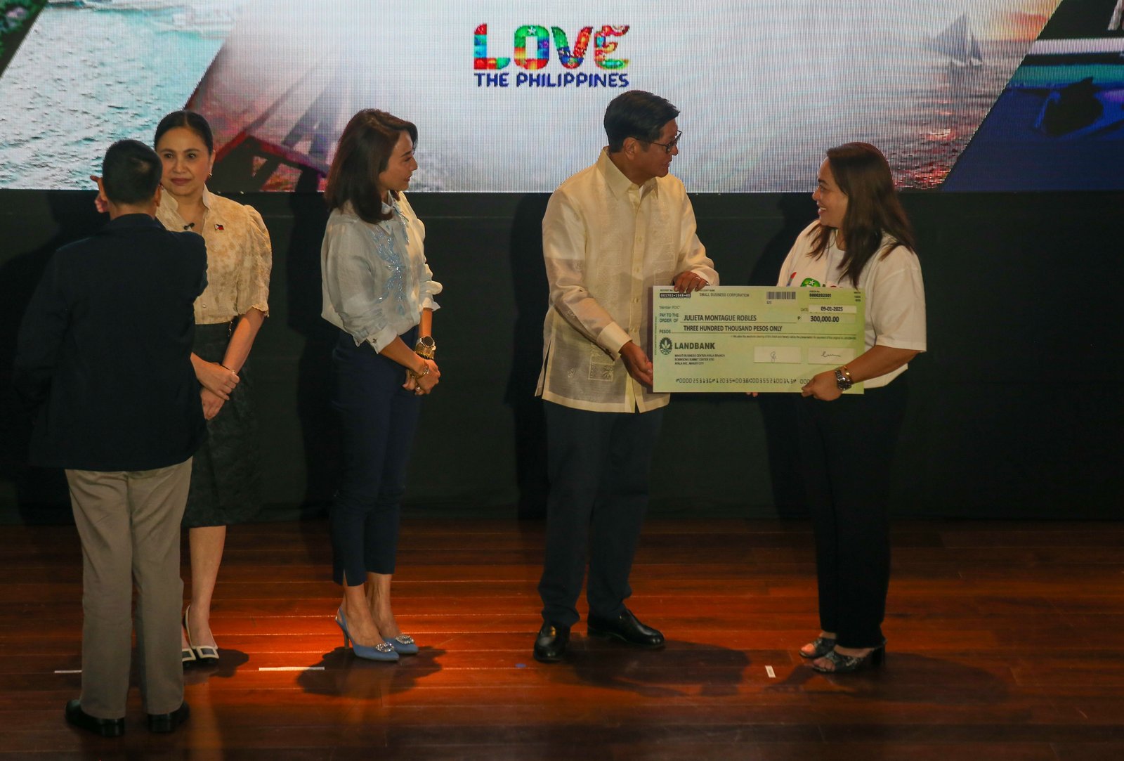 President Ferdinand Marcos Jr., Tourism Secretary Ma. Esperanza Christina Garcia-Frasco, and Trade Secretary Ma. Christina Roque lead the awarding of loans to tourism micro, small, and medium enterprises (MSMEs) during the Turismo Asenso Loan Program ceremony in Pasay City on 01 September 2025. The program, a joint initiative of the Department of Tourism and the Department of Trade and Industry, provides MSMEs with low-interest financing to expand operations, improve services, and promote sustainable growth.