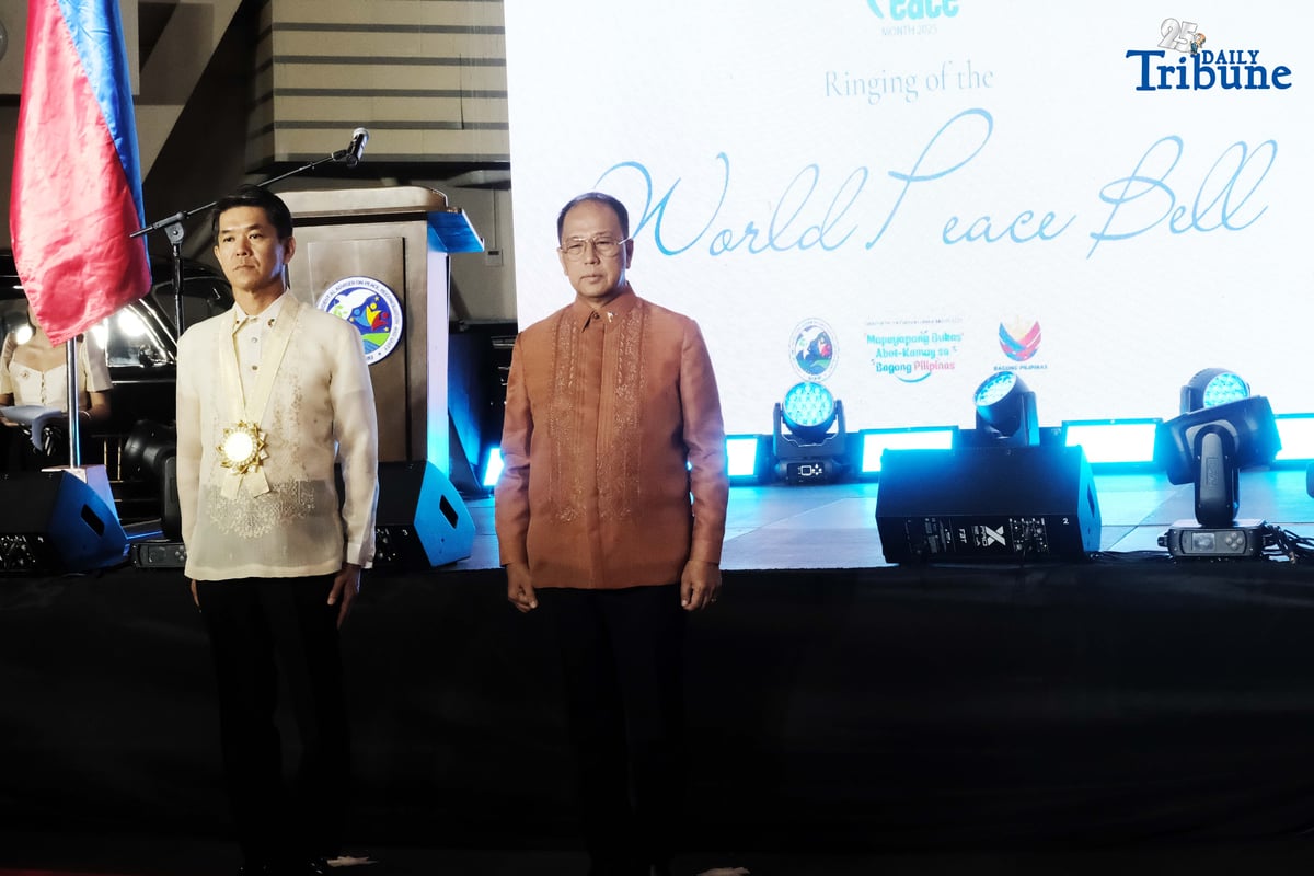 As part of the National Peace Consciousness Month celebration, Presidential Adviser on Peace, Reconciliation and Unity Secretary Carlito Galvez Jr. and Japanese Ambassador to the Philippines Endo Kazuya lead the ceremonial ringing of the peace bell at the Presidential Car Museum in Quezon City on Monday